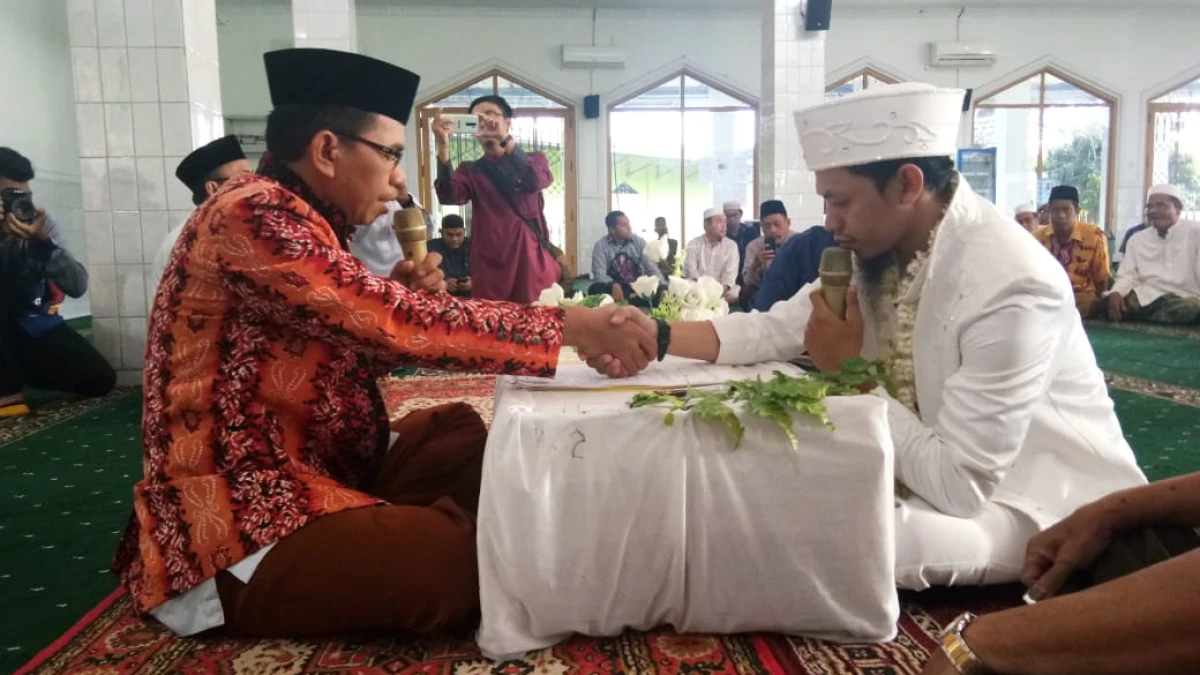 Sahkah Ijab Kabul dengan Hanya Menjawab ‘Saya Terima’?